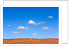 Small Cumulus Clouds Above Vermilion Cliffs by Anonymous