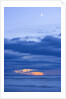 New Moon and Cumulus Clouds Above Sea at Winter Dawn by Corbis