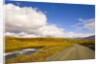 Clouds Above Autumn Tundra and Gravel Road in Alaska by Anonymous