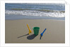 Toy Shovels in Sand by Anonymous