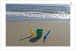 Toy Shovels in Sand by Anonymous