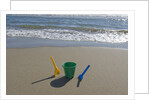 Toy Shovels in Sand by Anonymous