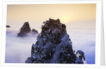 Mountain Peaks Above Clouds by Anonymous