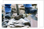 Construction Worker Using Sledgehammer by Anonymous
