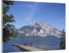 Wooden Boat Tied to Dock on Lake by Anonymous