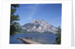 Wooden Boat Tied to Dock on Lake by Anonymous