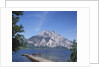 Wooden Boat Tied to Dock on Lake by Anonymous