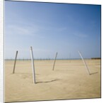 Bent Poles on the Beach by Jim Vecchi