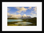 Mountains Shrouded in Clouds near Lake by Anonymous