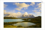 Mountains Shrouded in Clouds near Lake by Anonymous