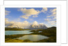 Mountains Shrouded in Clouds near Lake by Anonymous