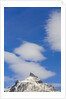 Clouds and Snowy Mountain Peak by Anonymous