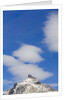 Clouds and Snowy Mountain Peak by Anonymous