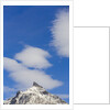 Clouds and Snowy Mountain Peak by Anonymous