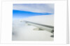 Airplane Wing Above Clouds by Anonymous