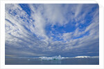 Clouds Above Sea and Snow-covered Coast by Anonymous