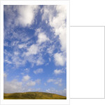 Cumulus Clouds above Hill by Anonymous