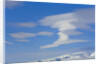 Lenticular Clouds Floating above Snow-covered Glacier by Anonymous
