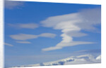 Lenticular Clouds Floating above Snow-covered Glacier by Anonymous