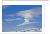 Lenticular Clouds Floating above Snow-covered Glacier by Anonymous