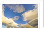 Cumulus and Lenticular Clouds at Sunrise by Anonymous