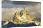 Fitzroy Massif and Cumulus Clouds at Sunrise by Anonymous