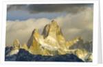 Fitzroy Massif and Cumulus Clouds at Sunrise by Anonymous