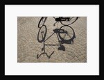 Bicycle Shadow on Cobblestone by Anonymous
