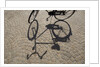 Bicycle Shadow on Cobblestone by Anonymous