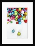 Christmas ornaments on snow by Anonymous