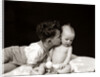 1940s Curly Haired Boy Toddler Leaning And Kissing Cute Baby by Anonymous