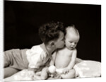 1940s Curly Haired Boy Toddler Leaning And Kissing Cute Baby by Anonymous