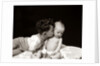 1940s Curly Haired Boy Toddler Leaning And Kissing Cute Baby by Anonymous