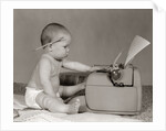 1960s Businesslike Baby With Pencil Behind Ear Typing On Typewriter by Anonymous
