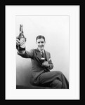 1920s 1930s Man Holding Up Huge Distorted Beer Bottle In One Hand And A Regular Size Glass Of Beer In Other by Anonymous