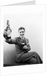 1920s 1930s Man Holding Up Huge Distorted Beer Bottle In One Hand And A Regular Size Glass Of Beer In Other by Anonymous