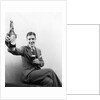 1920s 1930s Man Holding Up Huge Distorted Beer Bottle In One Hand And A Regular Size Glass Of Beer In Other by Anonymous
