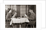 1950s Couple Man Woman Reading Restaurant Menus by Anonymous