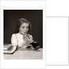 1950s 1960s School Girl Using Straw Drinking Carbonated Beverage From Bottle by Anonymous