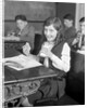 1920s School Girl Eating Lunch At Her Desk Drinking From A Bottle Of Milk Holding A Sandwich by Anonymous
