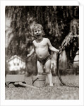 1940s 1950s Wet Young Boy Toddler Outside Playing With Water Hose by Anonymous