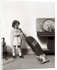 1930s Little Girl Vacuuming With Eureka Electric Vacuum Cleaner by Anonymous
