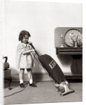 1930s Little Girl Vacuuming With Eureka Electric Vacuum Cleaner by Anonymous
