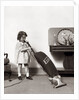 1930s Little Girl Vacuuming With Eureka Electric Vacuum Cleaner by Anonymous