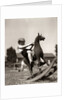 Little Boy on Rocking Horse Toy by Anonymous