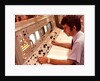 1970s Man Sitting At Control Panel Of NASA Mission Control by Anonymous