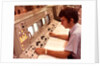 1970s Man Sitting At Control Panel Of NASA Mission Control by Anonymous