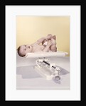 1950s 1960s Baby Lying On Weight Scale by Anonymous