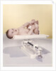 1950s 1960s Baby Lying On Weight Scale by Anonymous