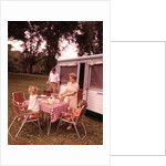 1960s Family Rv Camping Father Grilling Mother And Girls Setting Table by Anonymous
